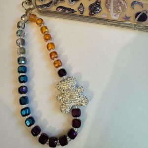 Cell phone wristlet from The Charm Hut works on any phone case